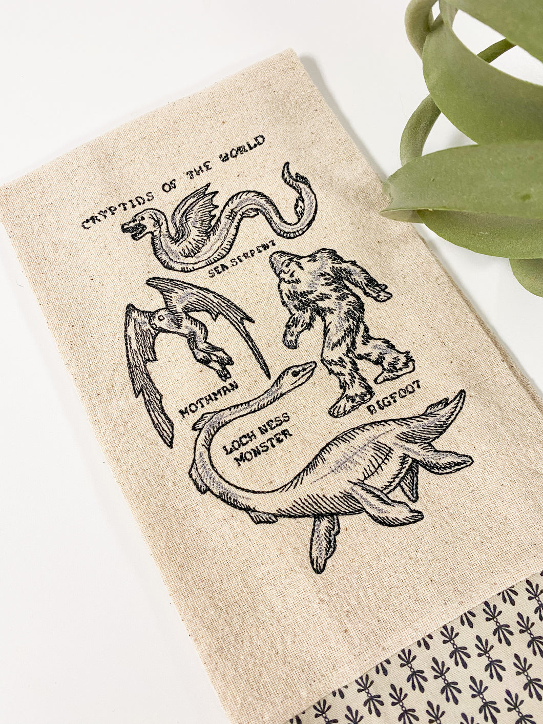 Cryptids of the World Tea Towel